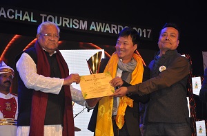 The Governor of Arunachal Pradesh Shri PB Acharya presenting awards on the   occasion of State Tourism Award function at IG Park Itanagar on 31st January�2017.